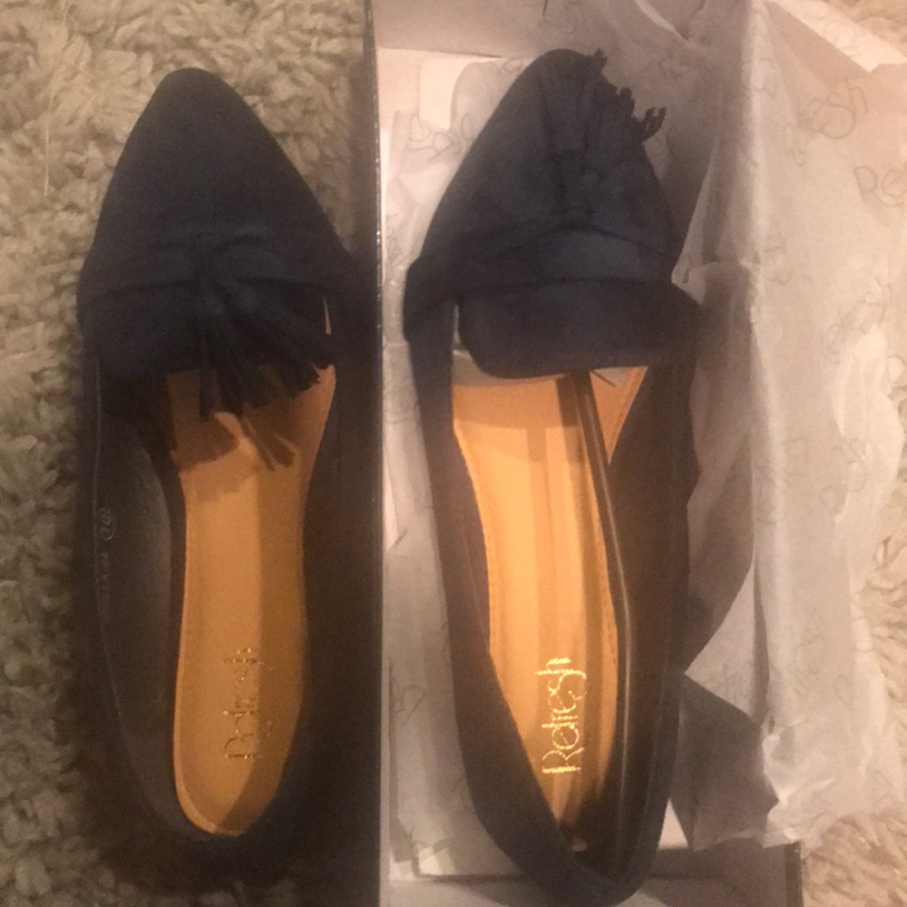 NWT and box! Never worn Navy Flats.